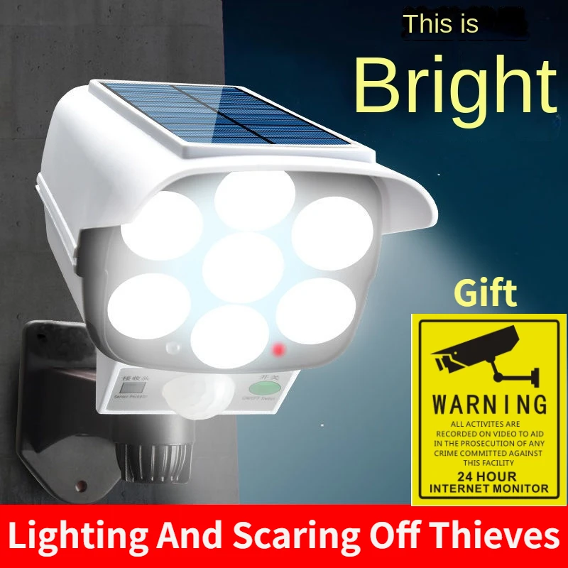 Halo Outdoor Lighting - 屋外ソーラーライトモーションセンサーセキュリティダミーカメラワイヤレスフラッドライトIP65防水77 LEDランプ3モード家庭菜園用